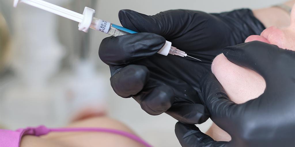 Licensed clinicians receiving hands‑on injectable training at AURSPA & Face Body Plus luxury med‑spa in Middleburg, FL