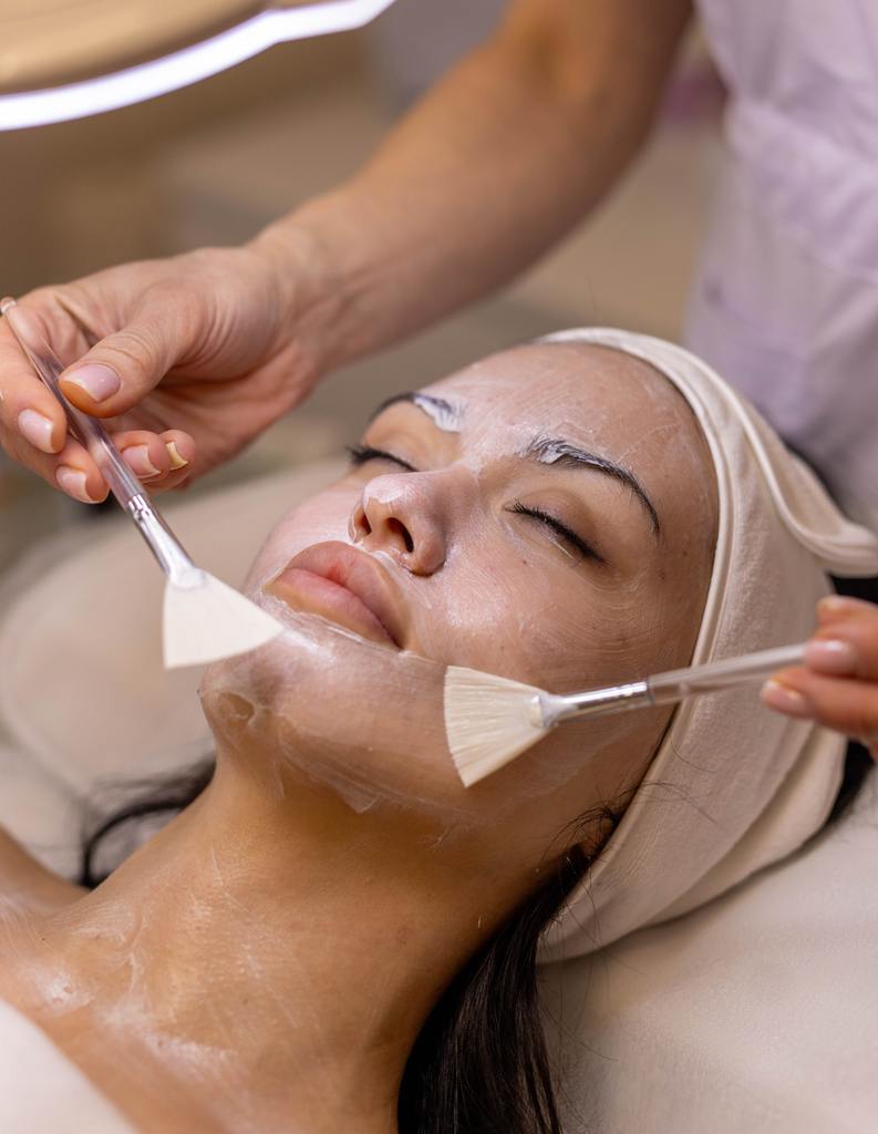 Bride enjoying a customized facial before her wedding at AURSPA in Oakleaf Plantation, FL to achieve glowing, radiant skin for her big day.