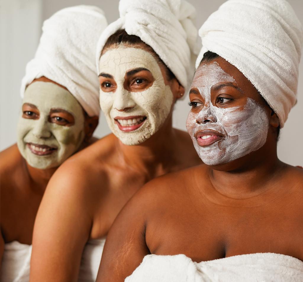 Bride and bridal party relaxing during a luxury spa day with facials and massages at AURSPA in Oakleaf Plantation near Orange Park and Jacksonville, FL.